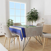 Dragon Celtic knot tablecloth on dining set with blue border and green dragon motif