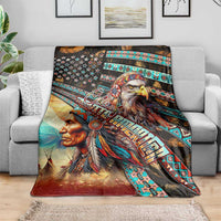 Native-themed blanket draped on sofa with eagle center and turquoise patterned trim