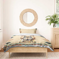 Beige wolf dreamcatcher bedding set with duvet and two pillows on a bed