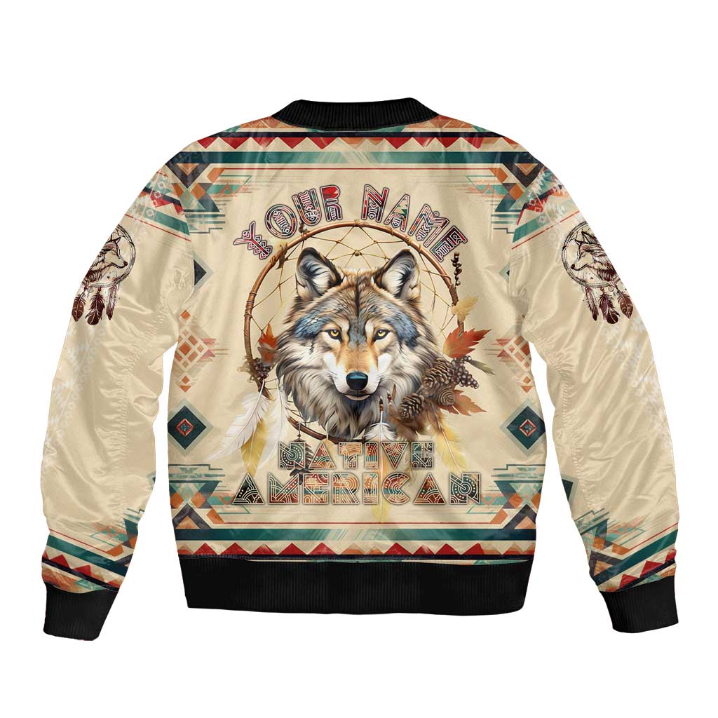 Beige bomber jacket with wolf dreamcatcher graphic, back view, black ribbed collar and hem