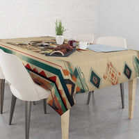 Beige rectangular wolf artwork tablecloth with teal, red, and tan geometric trim