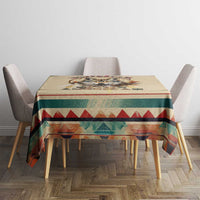 Beige wolf dreamcatcher tablecloth with multicolor border on wooden dining table