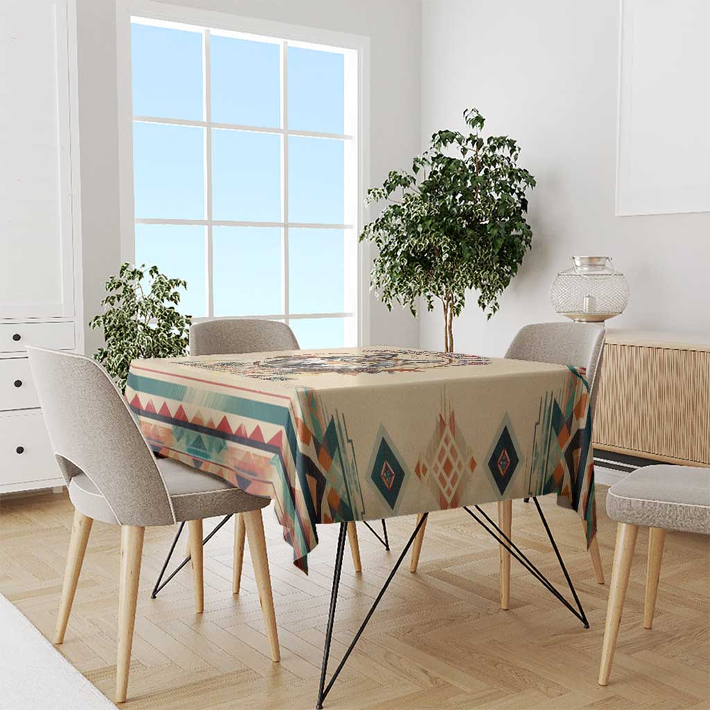 Beige wolf tablecloth with southwestern geometric band across dining table
