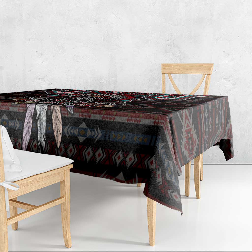 Warrior skull tablecloth draped on table with black, red and teal geometric print
