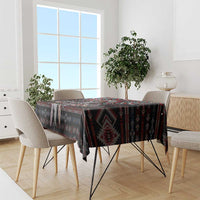 Warrior skull tablecloth on dining table with black, red and teal patterned design