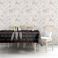 Warrior skull tablecloth on table with dark geometric tribal pattern and red and teal accents