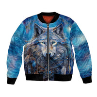 Blue bomber jacket with full-zip front, ribbed black cuffs, and detailed wolf face art