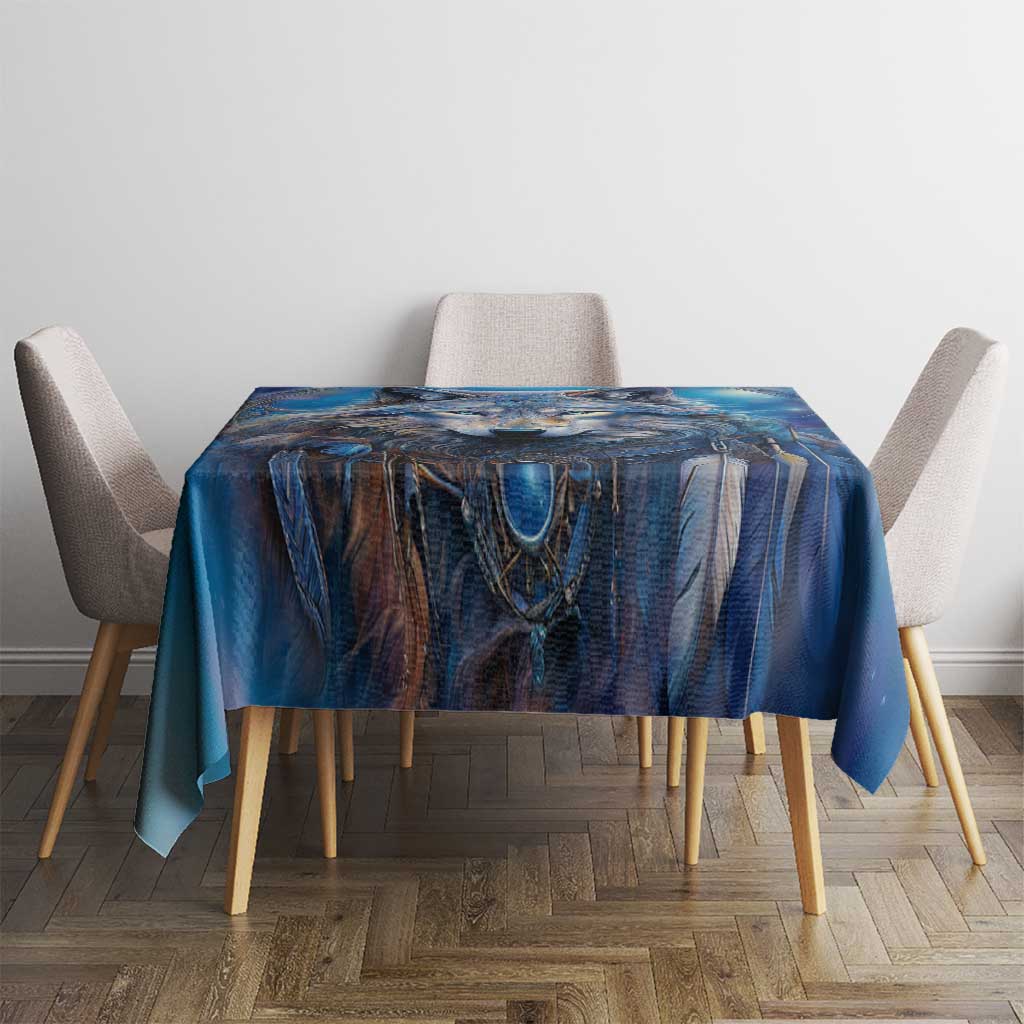 Blue wolf portrait tablecloth with decorative fringe trim along the edges