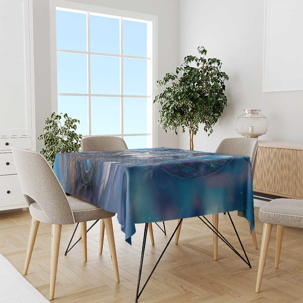 Blue galaxy wolf tablecloth covering a dining table, with draped sides