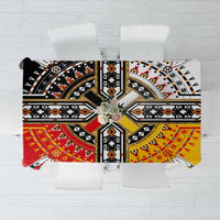 Native American tablecloth with black, red, yellow, and white geometric cross medallion