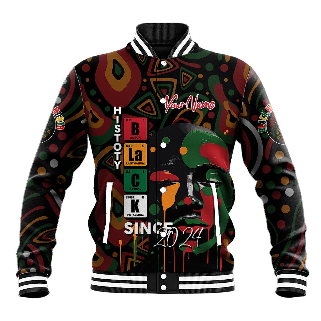 Black baseball jacket with striped collar/cuffs, front portrait graphic and red/green text.