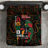 Personalized bedding set top view: dark duvet cover with portrait graphic and “Your Name”