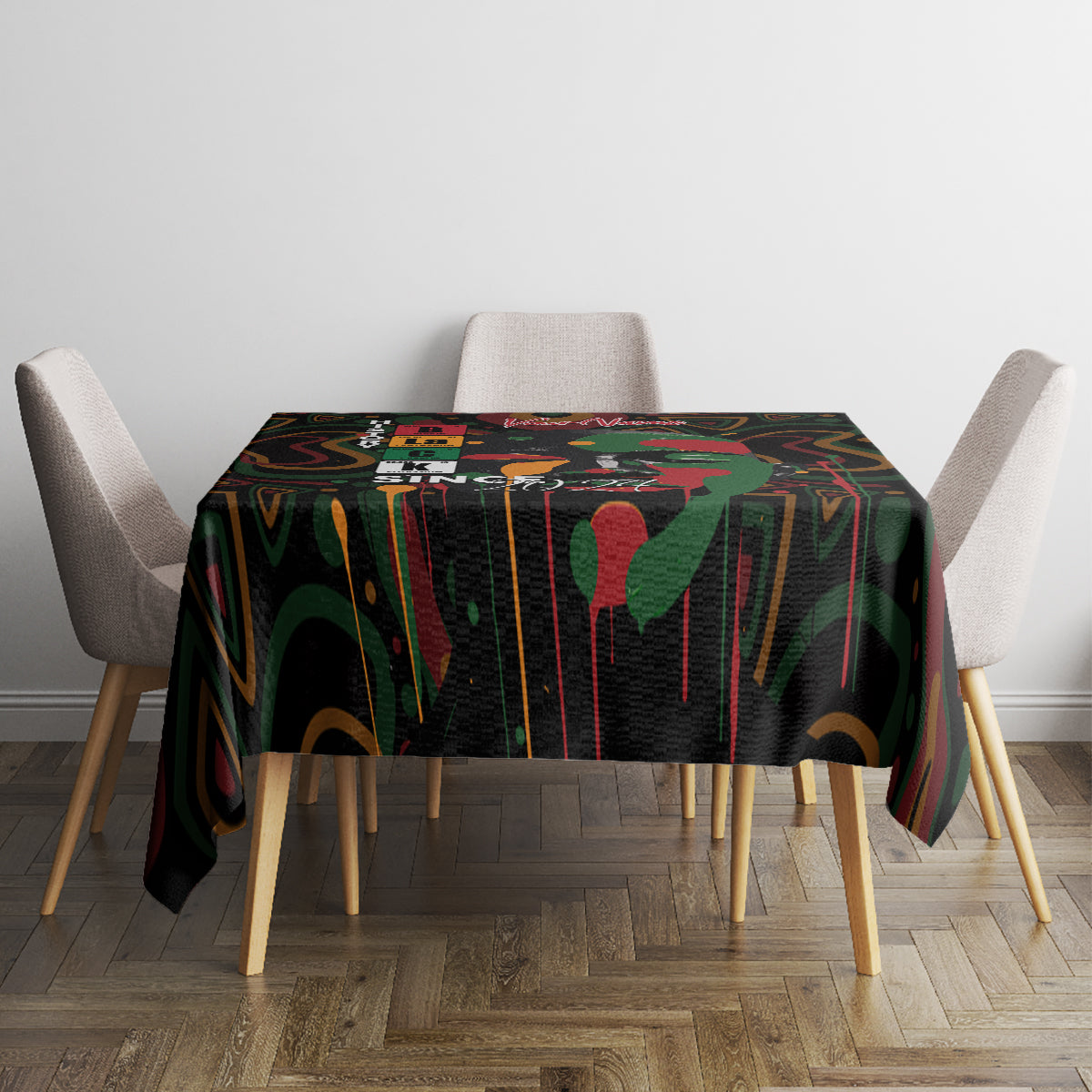 Black tablecloth with colorful abstract print on a square dining table