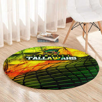 Round Jamaica Tallawahs cricket rug with green orange black design and wordmark