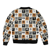 White unisex bomber jacket showing centered Adinkra symbol print panel, ribbed hem.