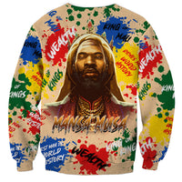 Beige crewneck sweatshirt with centered king portrait graphic, multicolor splatter, long sleeves