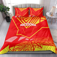 Red duvet and two pillowcases with yellow Macedonia flag geometric pattern and text "MACEDONIA"