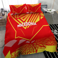 Red Macedonia flag bedding set showing yellow geometric rays, "MACEDONIA" text, and two pillows