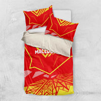 Red duvet with yellow Macedonia flag graphics, white piping accents, and two pillowcases