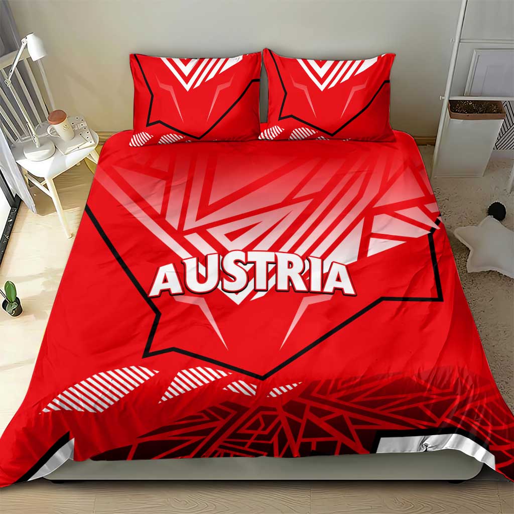 Red duvet cover and two pillowcases with Austria logo and bold abstract shapes