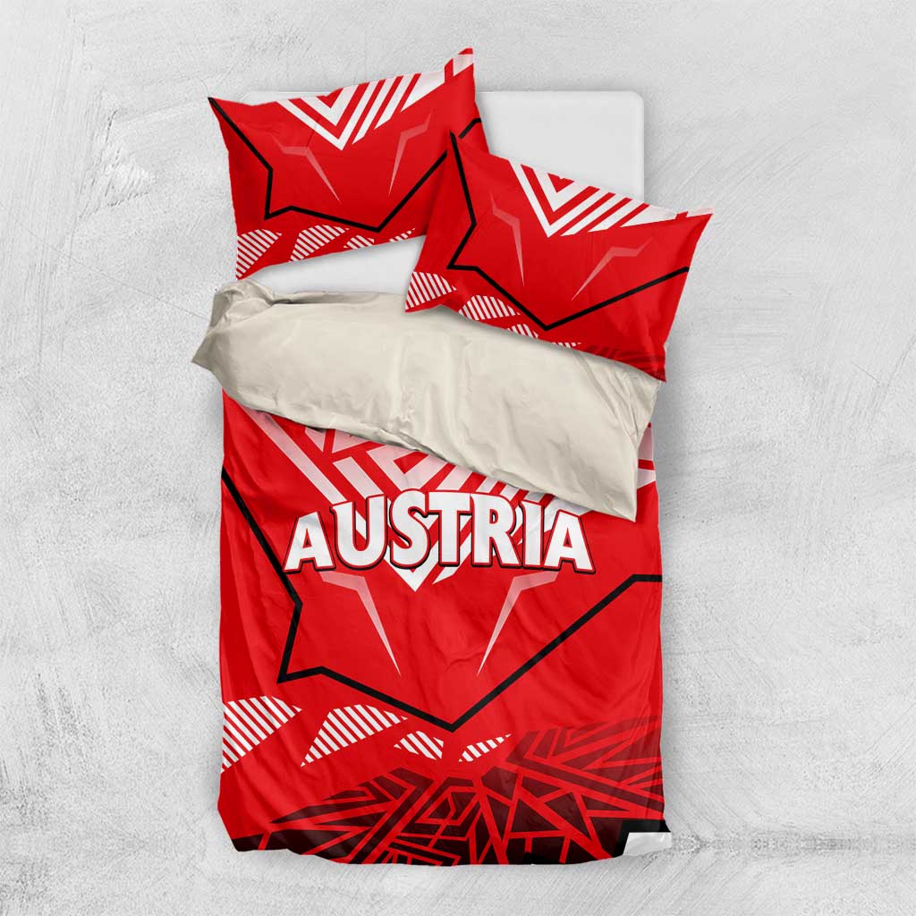Red bedding set on white surface: duvet cover and pillowcases with Austria text