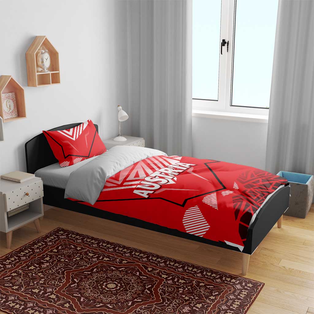 Red duvet cover and pillowcases on bed, Austria graphic with geometric red-and-white design