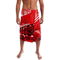 Red graphic swim shorts with AUSTRIA text and abstract geometric pattern panels