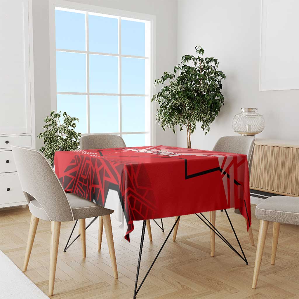 Red tablecloth with Austria emblem on dining table