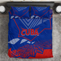 Blue bedding set with "CUBA" graphic, blue/red geometric pattern and two pillows