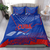 Blue bedding set with "CUBA" print on duvet and matching blue/red pillow set