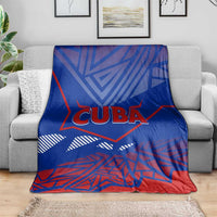Blue Cuba blanket with CUBA wordmark, red border, and bold geometric print