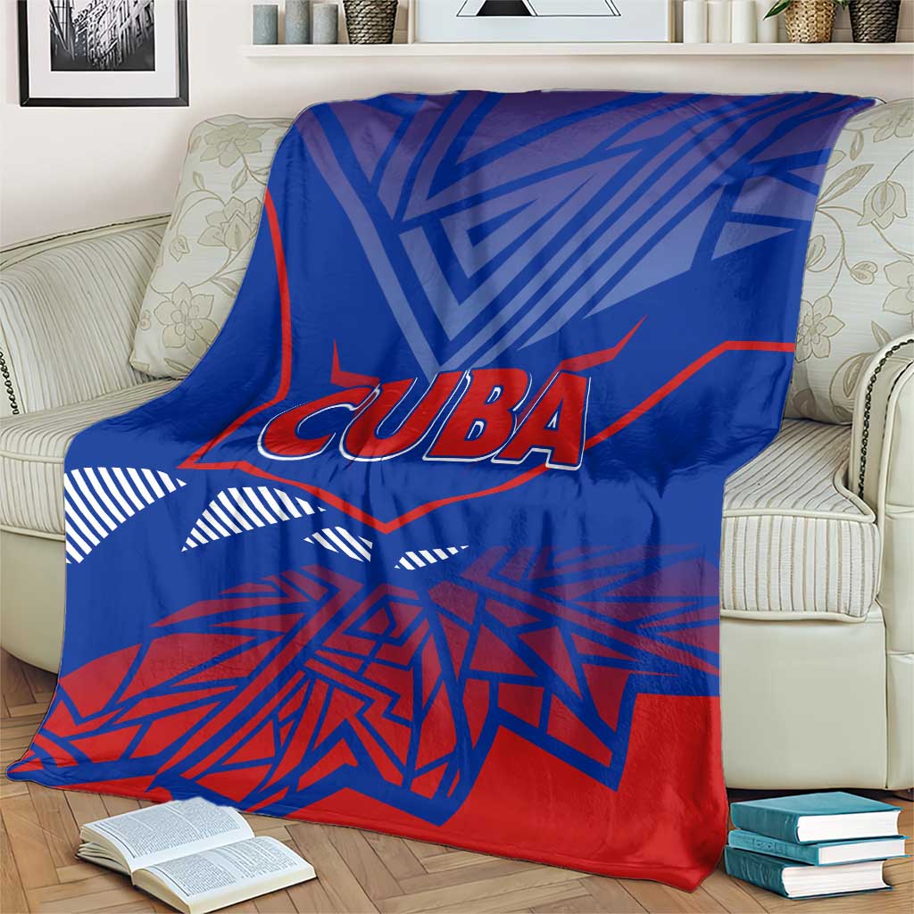 Blue Cuba blanket with large CUBA lettering and red-and-white geometric stripes
