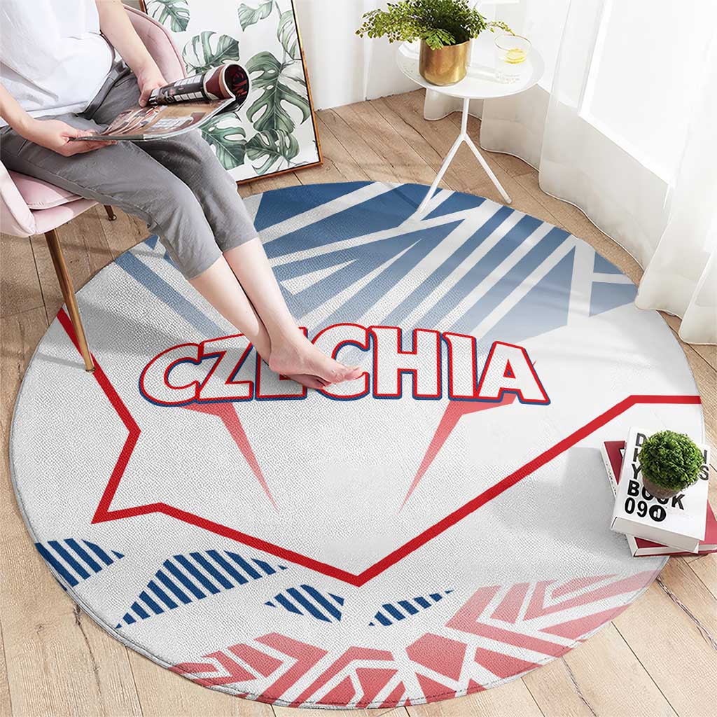 Round carpet laid flat with “CZECHIA” lettering, blue stripes, and red outline