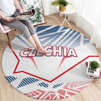 Round carpet laid flat with “CZECHIA” lettering, blue stripes, and red outline