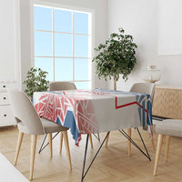 Blue, red and white geometric tablecloth with Czechia-style pattern on a dining table