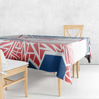 Blue, red and white geometric Czechia-style tablecloth on a dining table and bench