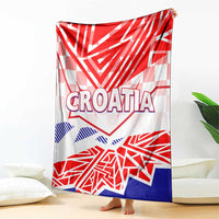 Croatia blanket on sofa with CROATIA text, white base with red and blue flag print