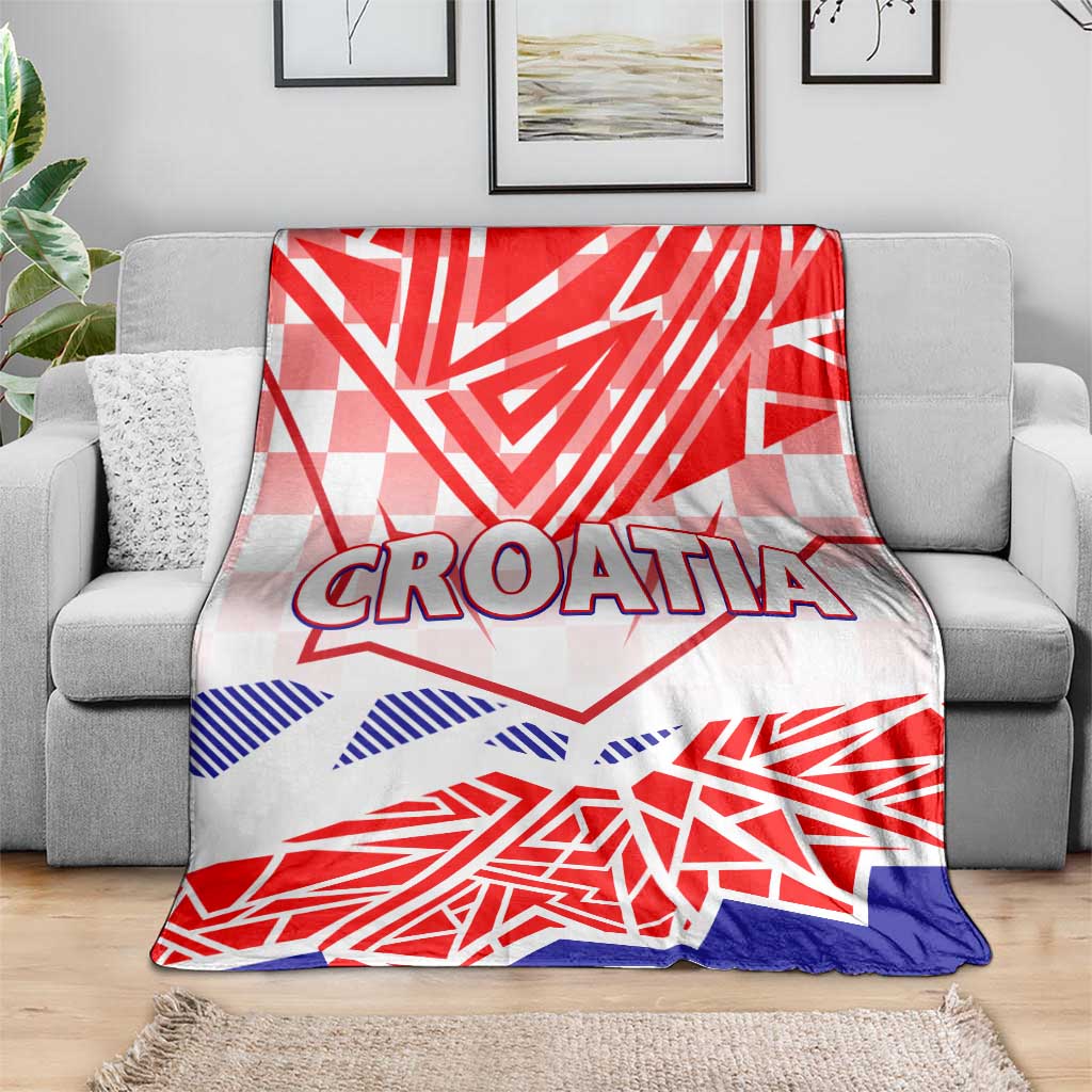 Croatia blanket on gray sofa, CROATIA wordmark over red white blue geometric flag design