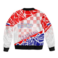 Red, white and blue checker and graphic bomber jacket with black ribbed trim