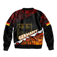 Unisex red and black bomber jacket with back Germany graphic, eagle emblem, and sleeve flag patch