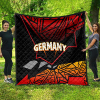 Black quilted Germany quilt with red map graphic, “Germany” text, and geometric lower design.
