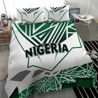Nigeria bedding set with white fabric, bold green geometric flag graphics, and "NIGERIA".