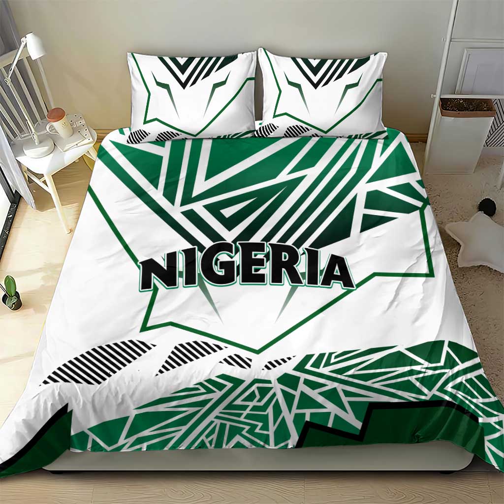 Nigeria duvet and pillowcases in white with green flag-style shapes and "NIGERIA" lettering.