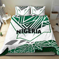 Nigeria duvet and pillowcases in white with green flag-style shapes and "NIGERIA" lettering.