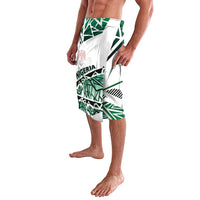 Green and white Nigerian flag print lavalava wrap skirt with layered geometric shapes