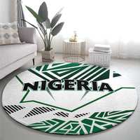 Round Nigeria flag carpet with large 'NIGERIA' text and green-and-white star design.