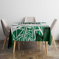 Nigerian flag tablecloth with green-and-white pattern on small dining table
