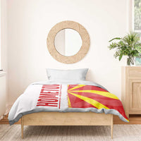 Macedonia flag bedding set on bed with red and yellow flag graphic and white pillowcases