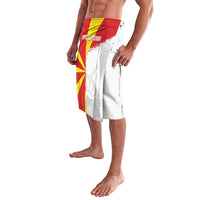 Men's red, yellow, and white lavalava with Macedonia text and map graphic, side view