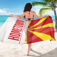 Macedonia flag and map print sarong, red and yellow geometric pattern draped